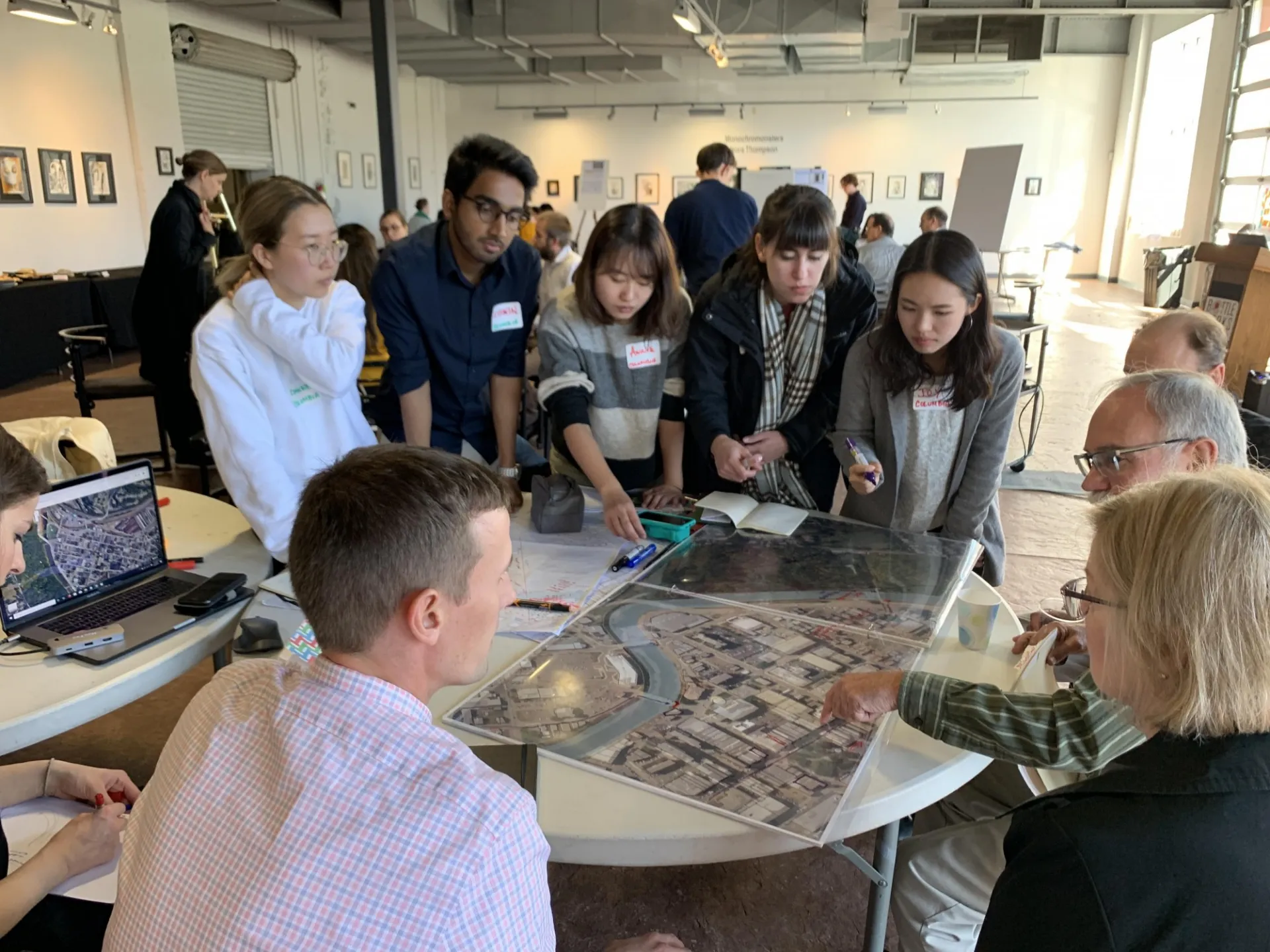 students facilitatingc table discussion