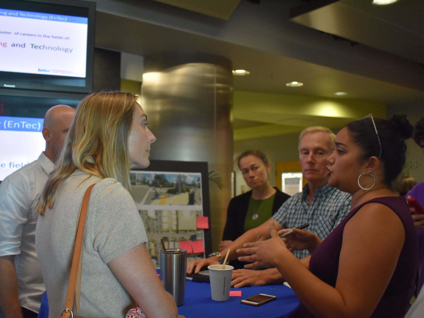 Elizabeth Wheaton talks with Miami Beach residents