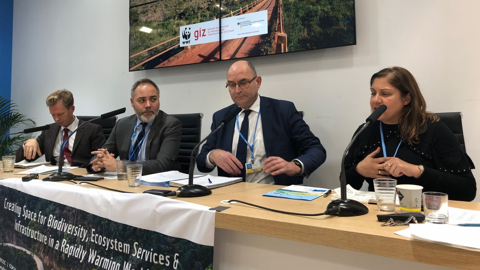 Thaddeus Pawlowski with panelists at the United Nations Climate Change Conference (COP24) in Katowice, Poland